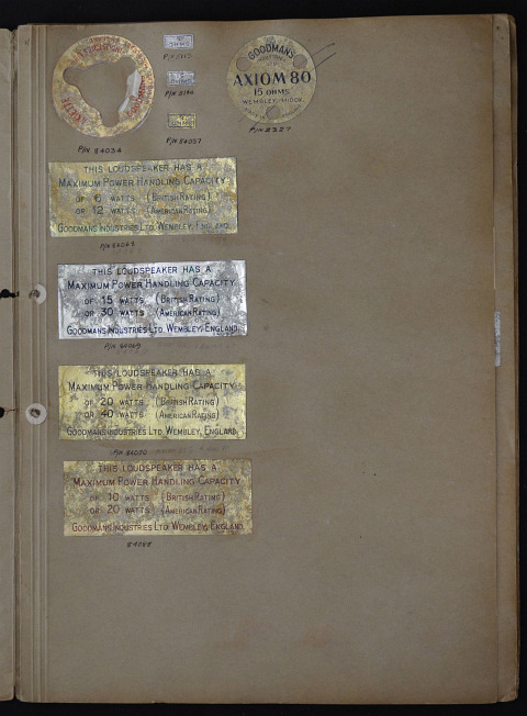 A volume of speaker labels, logos and promotional material for Goodmans speakers