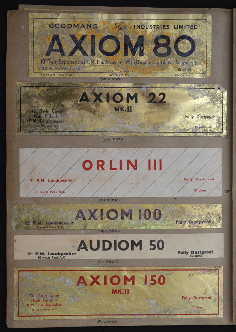 A volume of speaker labels, logos and promotional material for Goodmans speakers