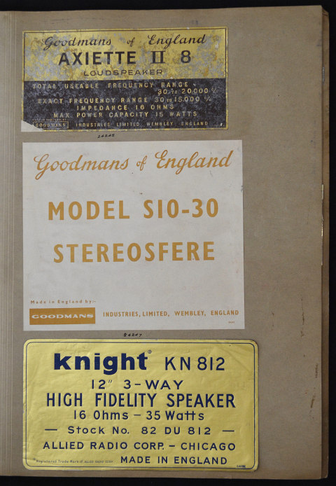 A volume of speaker labels, logos and promotional material for Goodmans speakers