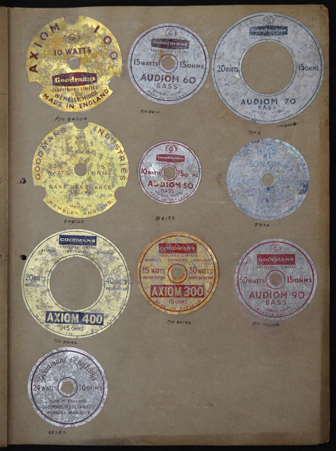 A volume of speaker labels, logos and promotional material for Goodmans speakers