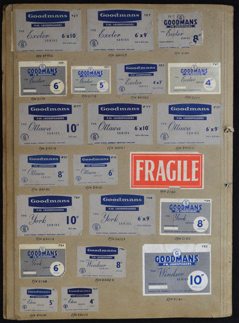 A volume of speaker labels, logos and promotional material for Goodmans speakers